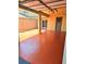 Covered patio with stained concrete, column supports, privacy fence, and secure access door at 1019 Grove St # 85, Maitland, FL 32751