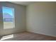 Bedroom with carpet, natural light, and a view of the outdoors through the window at 216 Harper Estates Cir, Lake Wales, FL 33859