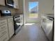 Well-equipped kitchen with stainless steel oven, dishwasher, and ample counter space at 216 Harper Estates Cir, Lake Wales, FL 33859