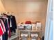 Spacious closet with shelving and hanging rod at 1159 Greenley Ave, Groveland, FL 34736