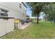 Fenced backyard with a storage shed and a view of the lake at 1541 Truscott Ct, Mount Dora, FL 32757