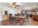 Kitchen with dark wood cabinets, stainless steel appliances, and tiled floor at 1541 Truscott Ct, Mount Dora, FL 32757