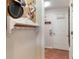 Laundry room with coat rack and adjacent door at 1541 Truscott Ct, Mount Dora, FL 32757