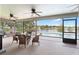 Screened patio with pool and lake view, perfect for relaxing at 1541 Truscott Ct, Mount Dora, FL 32757