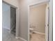 Convenient half bathroom with toilet and sink at 16039 Juniper Inlet Aly, Winter Garden, FL 34787