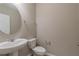 Clean bathroom with pedestal sink and toilet at 16039 Juniper Inlet Aly, Winter Garden, FL 34787