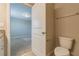 Guest bathroom with toilet and access to bedroom at 16039 Juniper Inlet Aly, Winter Garden, FL 34787