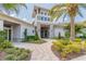 Modern clubhouse entrance with stone accents at 16039 Juniper Inlet Aly, Winter Garden, FL 34787