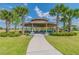 Charming gazebo with picnic tables, perfect for outdoor gatherings at 16039 Juniper Inlet Aly, Winter Garden, FL 34787