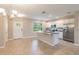 Modern kitchen with stainless steel appliances and granite countertops at 16039 Juniper Inlet Aly, Winter Garden, FL 34787