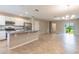 Spacious kitchen with granite countertops and stainless steel appliances at 16039 Juniper Inlet Aly, Winter Garden, FL 34787