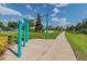 Outdoor fitness area with pull-up bars and walking path at 16039 Juniper Inlet Aly, Winter Garden, FL 34787