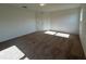 Cozy bedroom with carpet, natural light, and double door closet at 2181 Emma Ln, Lake Wales, FL 33859