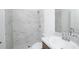 Modern bathroom featuring a tiled shower with glass door, updated sink and faucet, and tiled flooring at 2203 Carson Loop, Lake Wales, FL 33859
