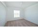 Bright bedroom with carpet flooring and a closet at 2203 Carson Loop, Lake Wales, FL 33859