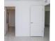 Hallway leading to a bathroom and other rooms, highlighting the spacious layout of the home at 2203 Carson Loop, Lake Wales, FL 33859