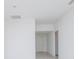 The hallway leads to other rooms, showcasing the home's layout and design features at 2203 Carson Loop, Lake Wales, FL 33859