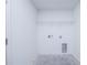 The laundry room is a functional space for laundry tasks, offering room for appliances at 2203 Carson Loop, Lake Wales, FL 33859