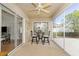 Enclosed patio with seating area, perfect for relaxing at 2605 Seneca Ave, The Villages, FL 32162