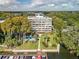 Lakefront condo with pool, boat docks, and lush landscape at 690 Osceola Ave # 308, Winter Park, FL 32789