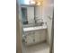 Bathroom with vanity and mirror at 690 Osceola Ave # 308, Winter Park, FL 32789