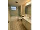 Clean bathroom with shower/tub combo and vanity at 690 Osceola Ave # 308, Winter Park, FL 32789