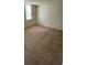 Bright bedroom with ample space and carpeted floors at 690 Osceola Ave # 308, Winter Park, FL 32789