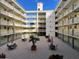 Inviting condo courtyard with seating areas at 690 Osceola Ave # 308, Winter Park, FL 32789