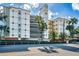 Lake Virginia condo building, featuring attractive architecture and landscaping at 690 Osceola Ave # 308, Winter Park, FL 32789