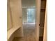 Hallway with access to bedroom and balcony at 690 Osceola Ave # 308, Winter Park, FL 32789