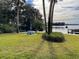 Picnic table overlooking a peaceful waterfront scene at 690 Osceola Ave # 308, Winter Park, FL 32789