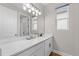 Modern bathroom with white vanity and quartz countertop at 7838 Sloewood Dr, Leesburg, FL 34748