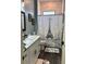 Modern bathroom with white vanity, quartz countertop, and Eiffel Tower-themed decor at 837 Oaks Shores Rd, Leesburg, FL 34748