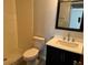 Updated bathroom with a walk-in shower, new vanity, and tile flooring at 940 Fenton Ln # 16, Lakeland, FL 33809