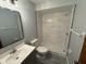 Stylish bathroom with a large walk-in shower and modern fixtures at 940 Fenton Ln # 16, Lakeland, FL 33809