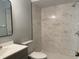 Bathroom with shower and updated vanity at 940 Fenton Ln # 16, Lakeland, FL 33809