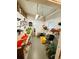 A home workshop with work bench, tools, and natural light at 102 Willow Ln, Leesburg, FL 34748