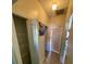 Hallway with linen closet and tile flooring at 1273 Tyler Lake Cir, Orlando, FL 32839