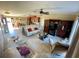 Living room with beige couches and a built-in cabinet at 1273 Tyler Lake Cir, Orlando, FL 32839