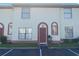 Charming townhouse with well-maintained lawn and parking spaces available in front at 1608 Long Ridge Ct # 274, Orlando, FL 32807