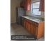 Functional kitchen with stainless steel appliances and generous cabinet space at 1608 Long Ridge Ct # 274, Orlando, FL 32807