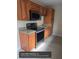Well-equipped kitchen featuring stainless steel appliances and granite countertops at 1608 Long Ridge Ct # 274, Orlando, FL 32807