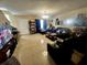 Living room with tile floors and a comfy seating area at 1608 Long Ridge Ct # 274, Orlando, FL 32807