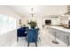 Bright dining area with marble floors and modern chandelier at 16546 7Th St, Montverde, FL 34756