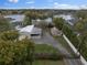 Lakefront property with house, detached garage, and gate at 1860 Lake Markham Rd, Sanford, FL 32771