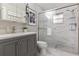 Modern bathroom with a gray vanity and a marble shower at 1860 Lake Markham Rd, Sanford, FL 32771