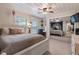 Cozy bedroom with a white bed frame and mirrored closet doors at 1860 Lake Markham Rd, Sanford, FL 32771