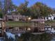 Charming lakefront home with dock and beautiful reflection at 1860 Lake Markham Rd, Sanford, FL 32771