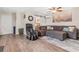 Living room with sectional sofa, massaging chair, and barn door at 1860 Lake Markham Rd, Sanford, FL 32771