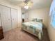 Cozy bedroom with double bed and built-in closet at 188 Azalea Trl, Leesburg, FL 34748